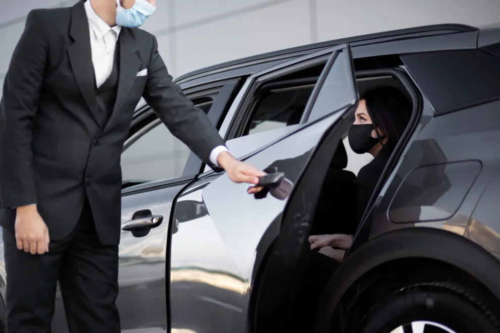 vip-airport-service-young-male-being-vip-driver-female-client